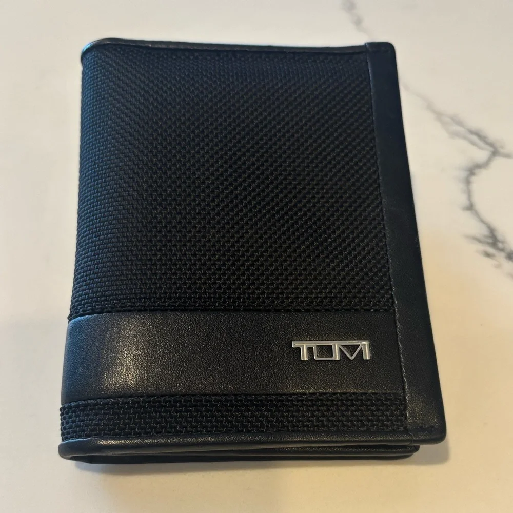 Tumi Black Textured Wallet new without tags in excellent condition